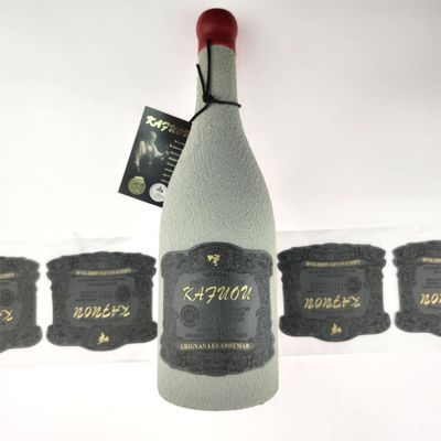 Bom preço Etiquetas de couro em PU sob medida em relevo Folha de ouro OEM Etiquetas artesanais Couro para garrafas de vinho on-line