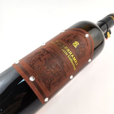 Bom preço OEM Marca Estampagem Etiqueta de couro PU Vinho personalizado Etiquetas de couro personalizadas Autocolante on-line